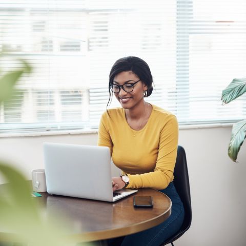 Woman working at a computer