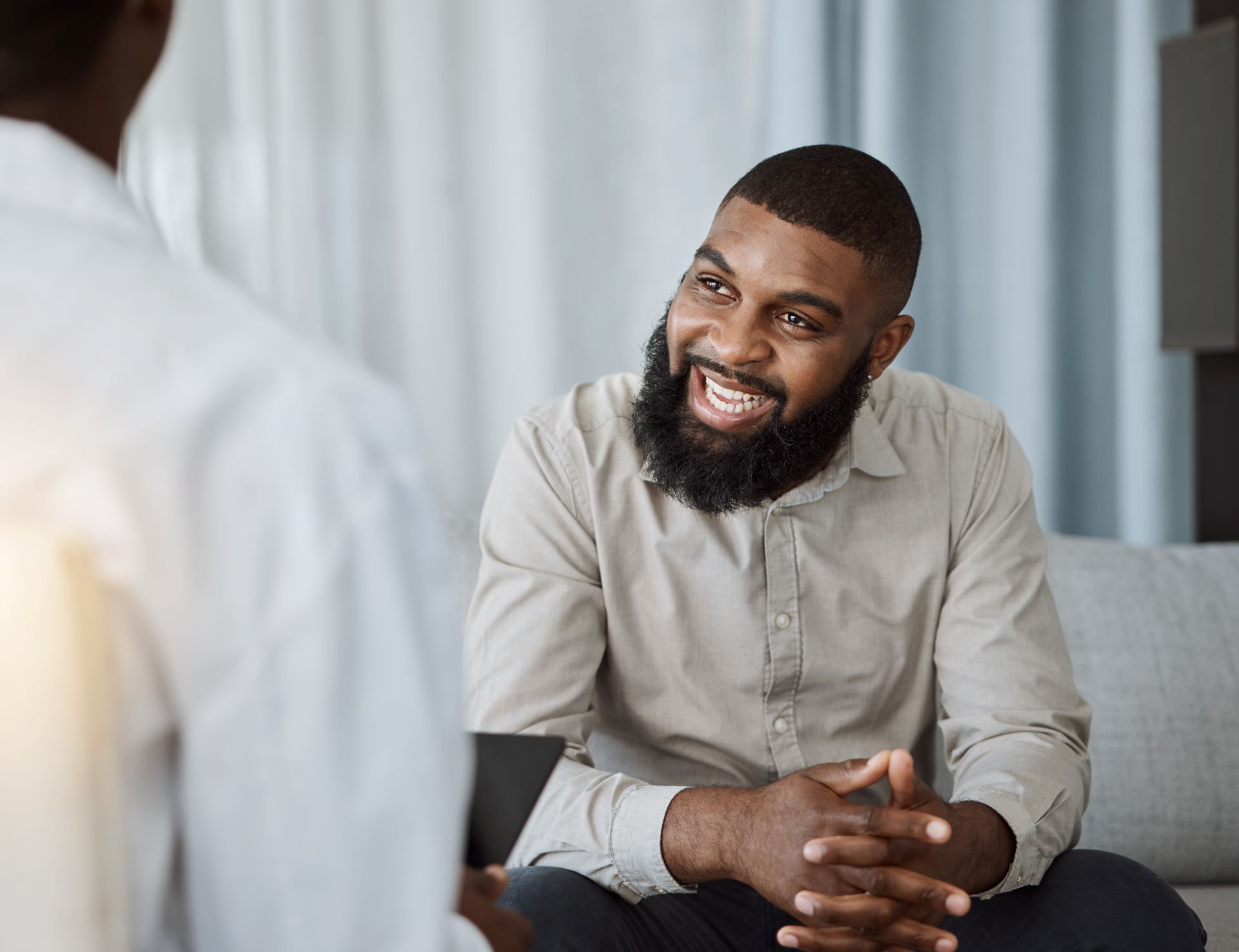 Smiling man in counseling