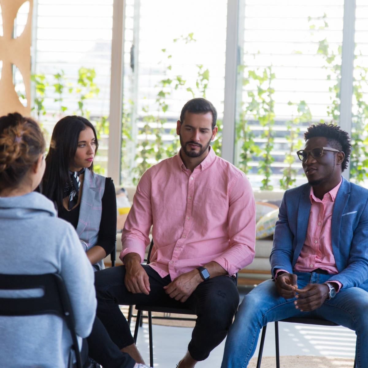 Group discussion with concerned faces