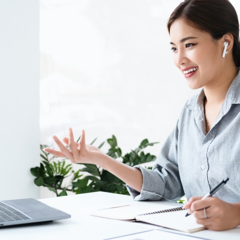 Woman participating in a virtual meeting