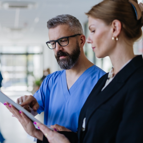 Healthcare workers looking at records