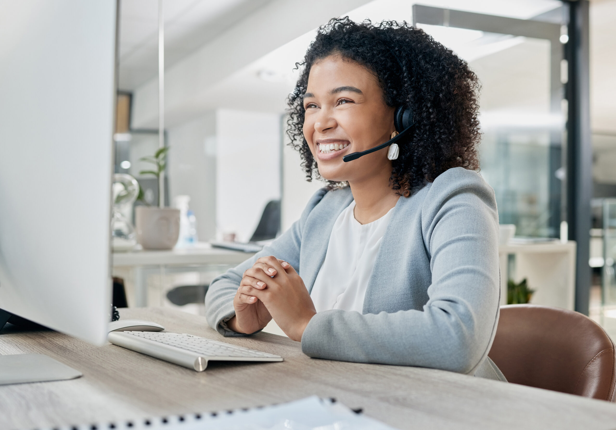 Call center counselor answering a phone call